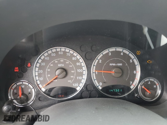 2005 Jeep Liberty Limited z VIN 1J4GL58K15W650799, wystawiony jako Copart lot #56036635 z przebiegiem 147 321 mil mil oraz Szkoda całkowita • Salvage title. Historia ofert i sprzedaży dostępna na DreamBid. Obrazek 9.
