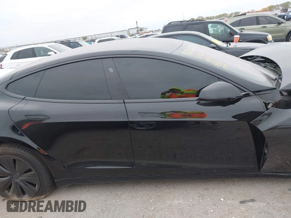 2022 Tesla Model S Plaid with VIN 5YJSA1E65NF484149, listed as a IAAI auction lot 40937538 with 11,459 mi miles and . Bid and sale history available at DreamBid. Image 12.
