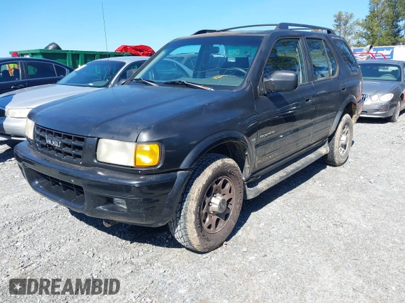 1998 Isuzu Rodeo S z VIN 4S2CK58W2W4315935, wystawiony jako IAAI lot #41593711 z przebiegiem 162 065 mil mil oraz . Historia ofert i sprzedaży dostępna na DreamBid. Obrazek 2.