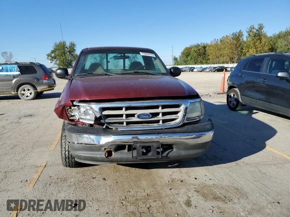 2003 Ford F-150 XL with VIN 1FTRF17L63NA32146, listed as a Copart auction lot 75204414 with 1,745,073 mi miles and Salvage Title. Bid and sale history available at DreamBid. Image 5.