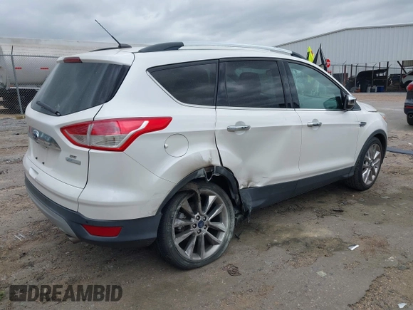 2016 Ford Escape SE with VIN 1FMCU0GX0GUA95789, listed as a IAAI auction lot 41829818 with 84,431 mi miles. Bid and sale history available at carsss.com. Image 4.