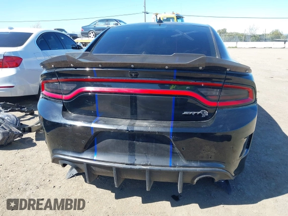 2017 Dodge Charger SRT Hellcat z VIN 2C3CDXL90HH509733, wystawiony jako IAAI lot #39143116 z przebiegiem Nie podano mil oraz . Historia ofert i sprzedaży dostępna na DreamBid. Obrazek 16.
