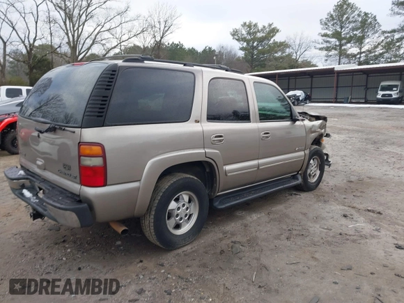 2002 Chevrolet Tahoe LT with VIN 1GNEC13Z22J256805, listed as a IAAI auction lot 41302460 with 249,578 mi miles and . Bid and sale history available at DreamBid. Image 4.
