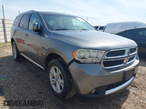 2011 Dodge Durango Crew with VIN 1D4RD4GG3BC729393, listed as a IAAI auction lot 41899010 with 174,392 mi miles and . Bid and sale history available at carsss.com. Image 1.