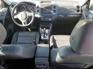 2014 Volkswagen Tiguan SEL with VIN WVGAV3AX0EW555873, listed as a Copart auction lot 55695955 with 69,984 mi miles and Salvage title. Bid and sale history available at DreamBid. Image 8.