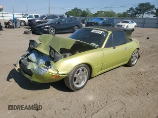 1996 Mazda MX-5 Miata z VIN JM1NA3530T0709751, wystawiony jako Copart lot #53388375 z przebiegiem 309 067 mil mil oraz Szkoda całkowita • Salvage title. Historia ofert i sprzedaży dostępna na DreamBid. Obrazek 1.