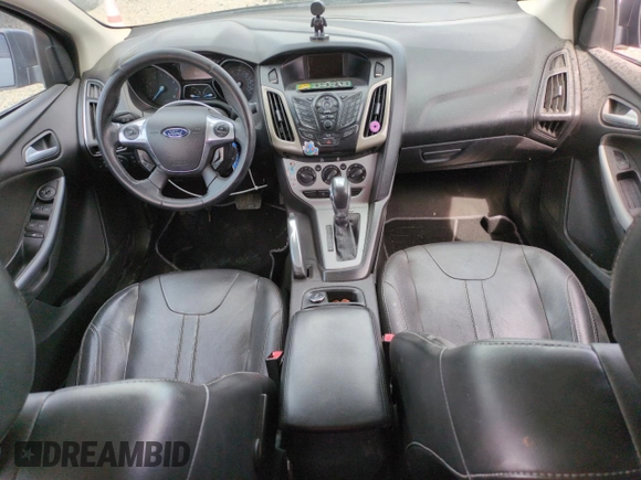 2013 Ford Focus SE with VIN 1FADP3F24DL189897, listed as a Copart auction lot 61970155 with 212,218 mi miles and Salvage title. Bid and sale history available at DreamBid. Image 8.