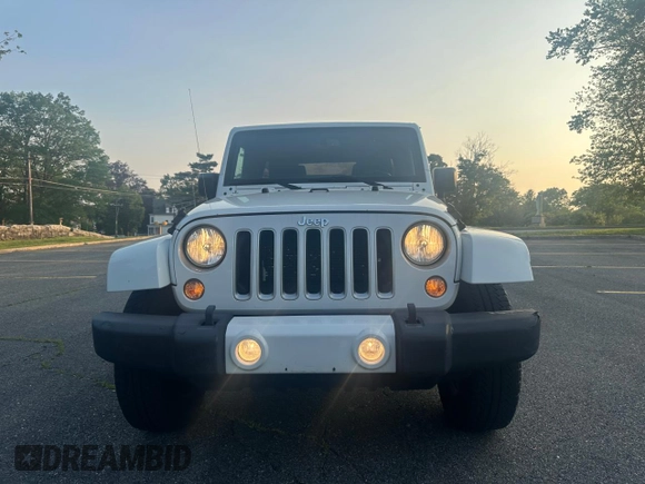 2016 Jeep Wrangler Unlimited Sahara with VIN 1C4BJWEG5GL215915, listed as a Copart auction lot 61690145 with 143,925 mi miles and Clean title. Bid and sale history available at DreamBid. Image 11.