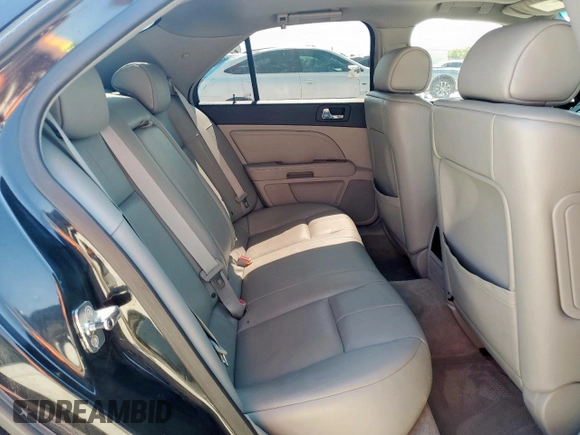 2009 Cadillac STS RWD z VIN 1G6DW67V390103790, wystawiony jako Copart lot #56596915 z przebiegiem 57 537 mil mil oraz Czysty tytuł • Clean title. Historia ofert i sprzedaży dostępna na DreamBid. Obrazek 10.