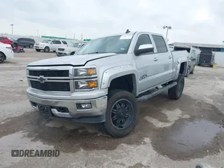 2015 Chevrolet Silverado 1500 LT with VIN 3GCUKREC8FG490856, listed as a IAAI auction lot 42067589 with 121,120 mi miles. Bid and sale history available at carsss.com. Image 2.