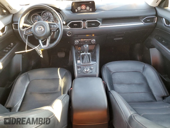 2018 Mazda CX-5 Grand Touring with VIN JM3KFBDMXJ0318474, listed as a Copart auction lot 46438545 with 58,702 mi miles and Salvage Title. Bid and sale history available at DreamBid. Image 8.