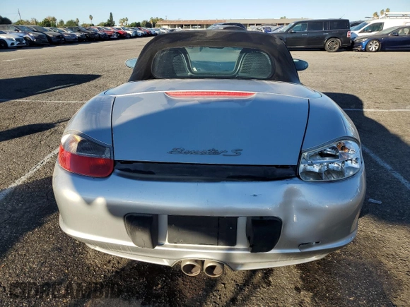 2003 Porsche Boxster S с VIN WP0CB29843U662463, выставлен на аукционе Copart как лот 78139614 с пробегом 102 109 миль миль и Списание • Salvage title. История ставок и продаж доступна на DreamBid. Изображение 10.