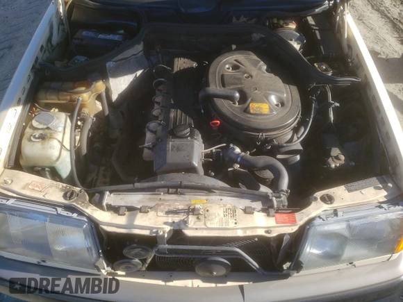 1988 Mercedes-Benz 300 with VIN WDBEA50D9JA698251, listed as a Copart auction lot 46977055 with 107,949 mi miles and Salvage Title. Bid and sale history available at DreamBid. Image 11.