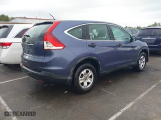 2014 Honda CR-V LX with VIN 3CZRM3H39EG703959, listed as a IAAI auction lot 41990964 with 87,424 mi miles. Bid and sale history available at carsss.com. Image 4.