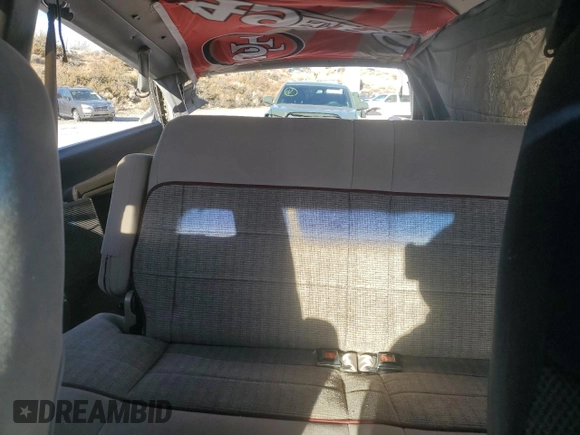 1993 Ford Aerostar z VIN 1FMDA31X9PZA67712, wystawiony jako Copart lot #80171704 z przebiegiem 229 582 mil mil oraz Szkoda całkowita • Salvage title. Historia ofert i sprzedaży dostępna na DreamBid. Obrazek 10.
