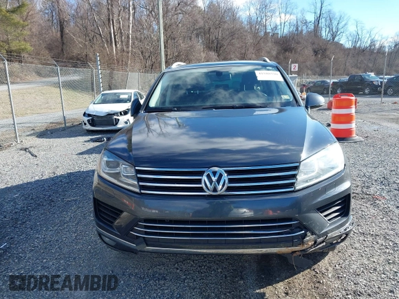 2016 Volkswagen Touareg Sport with VIN WVGEF9BP2GD005315, listed as a IAAI auction lot 41588590 with 134,709 mi miles and . Bid and sale history available at DreamBid. Image 12.