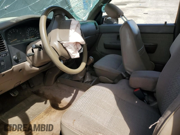1996 Toyota Tacoma z VIN 4TAWM72N5TZ191278, wystawiony jako Copart lot #57338965 z przebiegiem 233 749 mil mil oraz Szkoda całkowita • Salvage title. Historia ofert i sprzedaży dostępna na DreamBid. Obrazek 7.