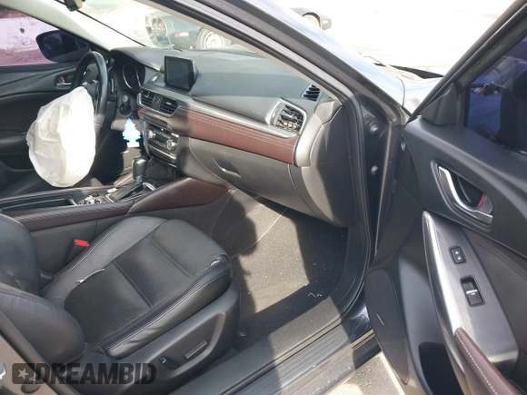 2016 Mazda Mazda6 i Grand Touring with VIN JM1GJ1W57G1441102, listed as a IAAI auction lot 41687057 with 144,876 mi miles. Bid and sale history available at carsss.com. Image 5.