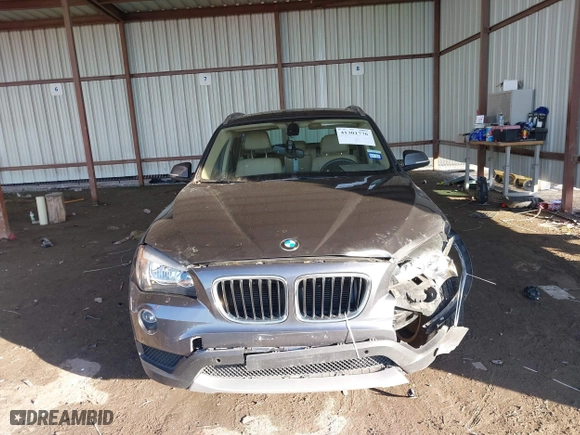 2013 BMW X1 28i with VIN WBAVM1C53DVW43228, listed as a IAAI auction lot 41301776 with 61,323 mi miles. Bid and sale history available at carsss.com. Image 12.