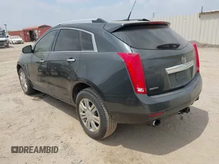 2014 Cadillac SRX Luxury Collection with VIN 3GYFNBE33ES599058, listed as a IAAI auction lot 42080556 with 128,917 mi miles. Bid and sale history available at carsss.com. Image 3.
