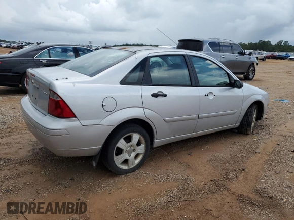 2006 Ford Focus S с VIN 1FAFP34N76W122783, выставлен на аукционе Copart как лот 60406325 с пробегом 290 434 миль миль и Списание • Salvage title. История ставок и продаж доступна на DreamBid. Изображение 3.