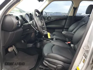 2015 MINI Countryman S z VIN WMWZC3C53FWT04644, wystawiony jako Copart lot #56415645 z przebiegiem 136 552 mil mil oraz Szkoda całkowita • Salvage title. Historia ofert i sprzedaży dostępna na DreamBid. Obrazek 7.