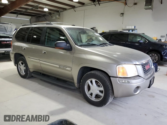 2003 GMC Envoy SLE z VIN 1GKDT13S432136642, wystawiony jako Copart lot #53467095 z przebiegiem 98 832 mil mil oraz Szkoda całkowita • Salvage title. Historia ofert i sprzedaży dostępna na DreamBid. Obrazek 4.