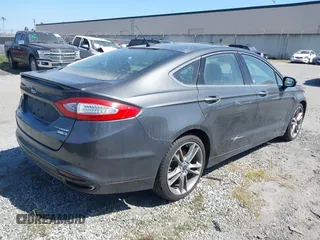 2015 Ford Fusion Titanium with VIN 3FA6P0D99FR258028, listed as a IAAI auction lot 41700630 with 82,084 mi miles. Bid and sale history available at carsss.com. Image 4.