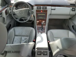 1997 Mercedes-Benz E-Class with VIN WDBJF72F8VA462335, listed as a Copart auction lot 50230895 with 97,831 mi miles and Salvage Title. Bid and sale history available at carsss.com. Image 8.