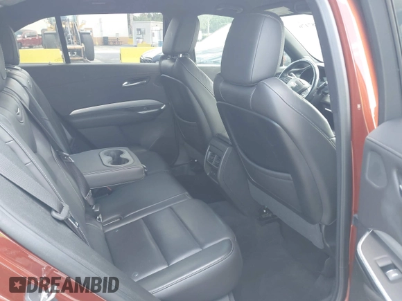 2019 Cadillac XT4 FWD Premium Luxury z VIN 1GYFZCR41KF183507, wystawiony jako IAAI lot #41987176 z przebiegiem 64 803 mil mil oraz . Historia ofert i sprzedaży dostępna na DreamBid. Obrazek 8.