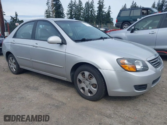 2009 Kia Spectra EX with VIN KNAFE221595659217, listed as a IAAI auction lot 42014406 with 140,527 mi miles. Bid and sale history available at carsss.com. Image 1.