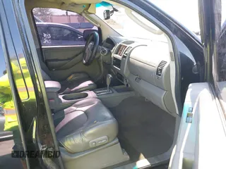2006 Nissan Frontier SE z VIN 1N6AD07WX6C458569, wystawiony jako IAAI lot #42317531 z przebiegiem 198 485 mil mil oraz . Historia ofert i sprzedaży dostępna na DreamBid. Obrazek 5.