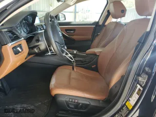 2015 BMW 4 Series 428i xDrive with VIN WBA4C9C53FD330038, listed as a Copart auction lot 77094584 with 123,906 mi miles and Salvage Title. Bid and sale history available at carsss.com. Image 7.