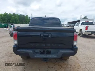 2020 Toyota Tacoma SR5 z VIN 3TMAZ5CN8LM138501, wystawiony jako IAAI lot #42321412 z przebiegiem 81 806 mil mil oraz . Historia ofert i sprzedaży dostępna na DreamBid. Obrazek 19.