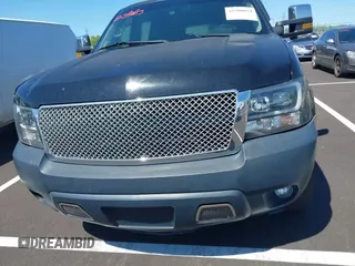 2014 Chevrolet Suburban LT z VIN 1GNSCJE02ER116017, wystawiony jako IAAI lot #42308074 z przebiegiem 228 365 mil mil oraz . Historia ofert i sprzedaży dostępna na DreamBid. Obrazek 12.