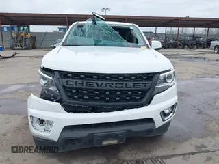 2019 Chevrolet Colorado 4WD Z71 z VIN 1GCGTDEN3K1317883, wystawiony jako IAAI lot #41439010 z przebiegiem 34 306 mil mil oraz . Historia ofert i sprzedaży dostępna na DreamBid. Obrazek 13.