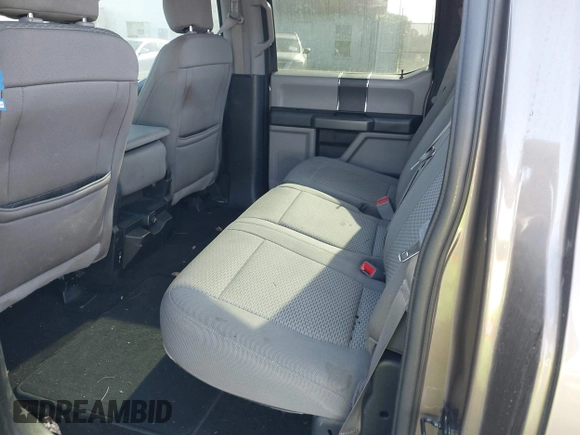 2018 Ford F-150 XL with VIN 1FTEW1EG1JFC31794, listed as a IAAI auction lot 41304111 with 129,058 mi miles and . Bid and sale history available at carsss.com. Image 8.