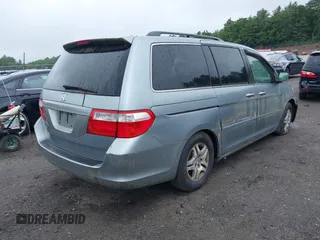 2006 Honda Odyssey EX with VIN 5FNRL38446B080677, listed as a IAAI auction lot 42458026 with 263,126 mi miles and . Bid and sale history available at DreamBid. Image 4.