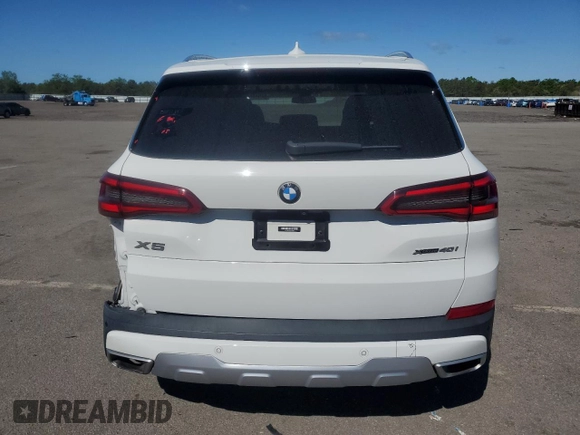 2020 BMW X5 xDrive40i with VIN 5UXCR6C02L9B78012, listed as a Copart auction lot 56568005 with 57,460 mi miles and Salvage title. Bid and sale history available at DreamBid. Image 6.