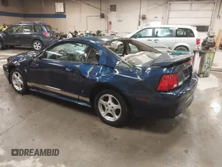 2002 Ford Mustang Standard z VIN 1FAFP40452F117630, wystawiony jako IAAI lot #41882744 z przebiegiem 85 218 mil mil oraz . Historia ofert i sprzedaży dostępna na DreamBid. Obrazek 3.