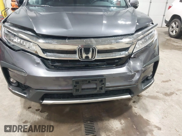 2019 Honda Pilot Touring 7-Passenger с VIN 5FNYF6H68KB082089, выставлен на аукционе IAAI как лот 42616148 с пробегом 69 913 миль миль и . История ставок и продаж доступна на DreamBid. Изображение 6.