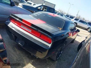 2014 Dodge Challenger SXT with VIN 2C3CDYAG8EH140008, listed as a IAAI auction lot 41437068 with 157,629 mi miles. Bid and sale history available at carsss.com. Image 4.
