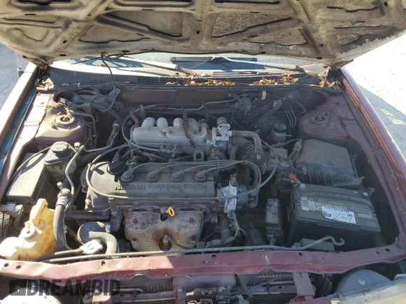 1996 Nissan Sentra XE z VIN 3N1AB41D3TL027288, wystawiony jako Copart lot #77255804 z przebiegiem 132 033 mil mil oraz Czysty tytuł • Clean title. Historia ofert i sprzedaży dostępna na DreamBid. Obrazek 11.