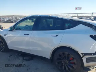 2023 Tesla Model Y Performance with VIN 7SAYGDEF1PF864976, listed as a IAAI auction lot 41667676 with Not Provided miles and . Bid and sale history available at DreamBid. Image 13.