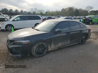 2022 Honda Civic Sport z VIN 2HGFE2F52NH534051, wystawiony jako Copart lot #50697535 z przebiegiem 122 655 mil mil oraz Szkoda całkowita • Salvage title. Historia ofert i sprzedaży dostępna na DreamBid. Obrazek 1.
