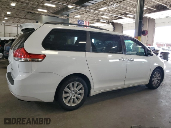 2013 Toyota Sienna XLE with VIN 5TDDK3DC9DS070424, listed as a Copart auction lot 61406715 with 193,583 mi miles and Salvage title. Bid and sale history available at DreamBid. Image 3.