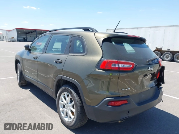2015 Jeep Cherokee Sport with VIN 1C4PJMAB9FW595102, listed as a IAAI auction lot 42257918 with 95,059 mi miles and . Bid and sale history available at DreamBid. Image 3.