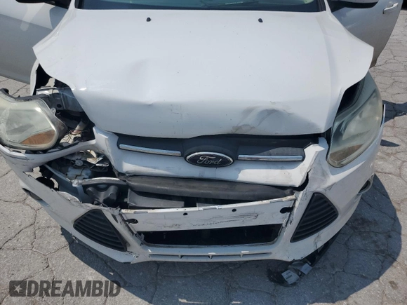 2012 Ford Focus SE z VIN 1FAHP3F24CL427067, wystawiony jako Copart lot #60402005 z przebiegiem 141 810 mil mil oraz Czysty tytuł • Clean title. Historia ofert i sprzedaży dostępna na DreamBid. Obrazek 11.