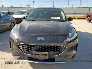 2020 Ford Escape SE z VIN 1FMCU0G62LUA54114, wystawiony jako Copart lot #58015855 z przebiegiem 106 857 mil mil oraz Szkoda całkowita • Salvage title. Historia ofert i sprzedaży dostępna na DreamBid. Obrazek 5.