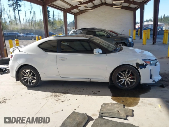 2014 Scion tC with VIN JTKJF5C7XE3073478, listed as a IAAI auction lot 42058385 with 151,491 mi miles. Bid and sale history available at carsss.com. Image 14.